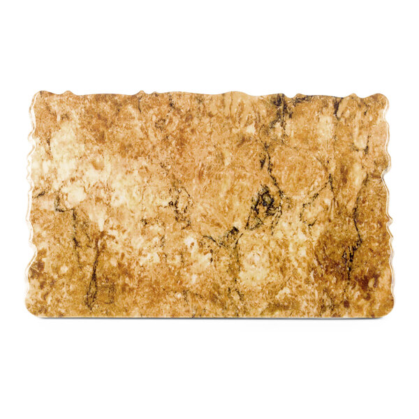 A close-up of the rustic granite surface of an Elite Global Solutions rectangular riser with one straight edge.