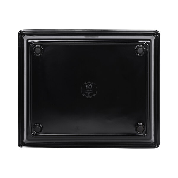 A black rectangular melamine bowl with a white background.
