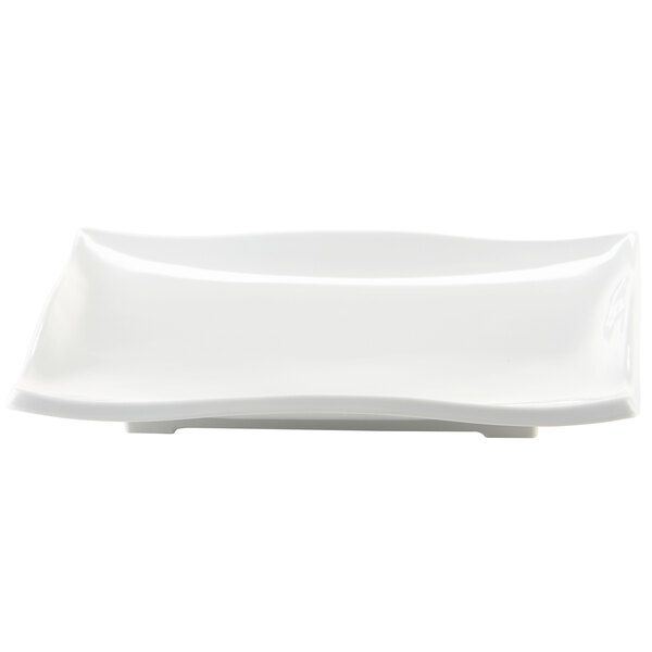 A white rectangular display platter with a curved edge.