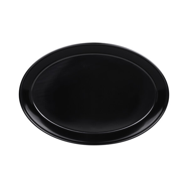 An Elite Global Solutions black oval melamine bowl on a counter in a deli.