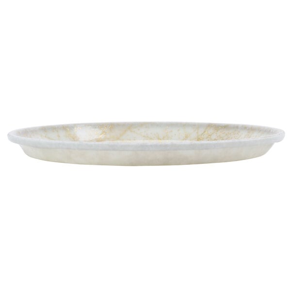 A white round fiberglass tray with a gold rim.