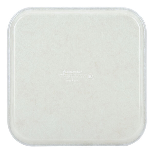 A white square Cambro tray with a white border.