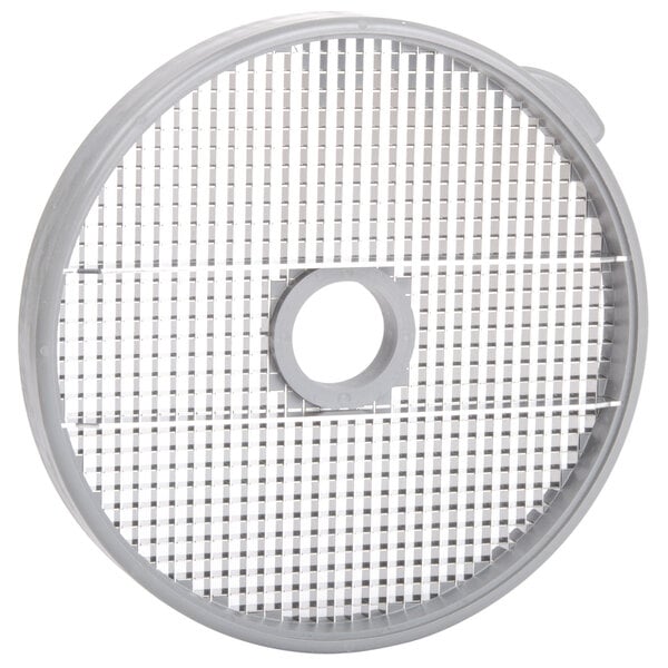 A round white plastic object with holes.