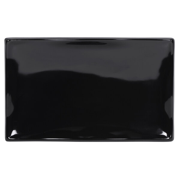A black rectangular Elite Global Solutions Ming wave platter.