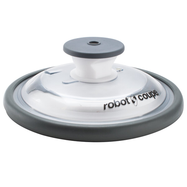 A Robot Coupe lid assembly with a grey rubber base.