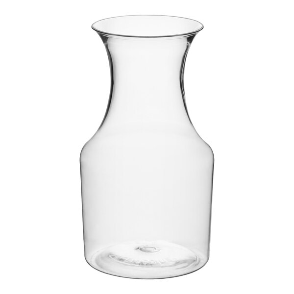 A clear glass pitcher or carafe with a wide mouth and a narrow neck.