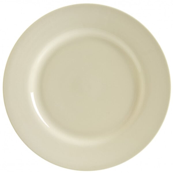 A close up of a white 10 Strawberry Street Royal Cream porcelain charger plate with a white rim.