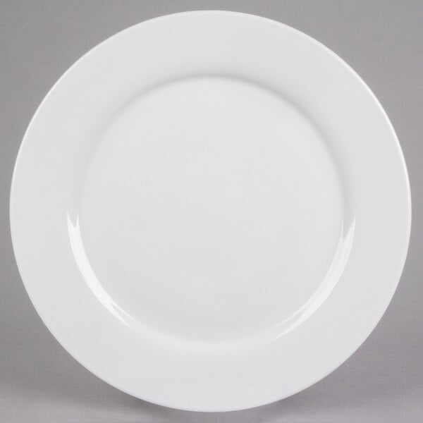 A white 10 Strawberry Street porcelain charger plate with a circular edge.