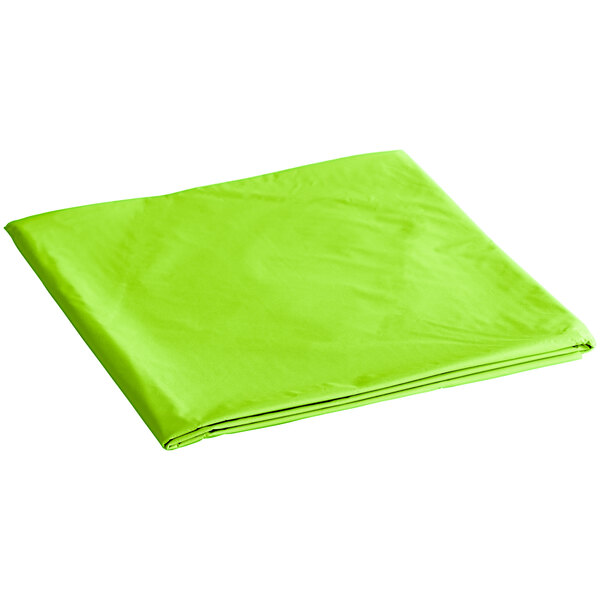 A green folded cloth on a white background.