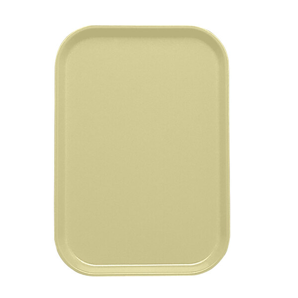 A rectangular lemon chiffon Cambro tray insert.