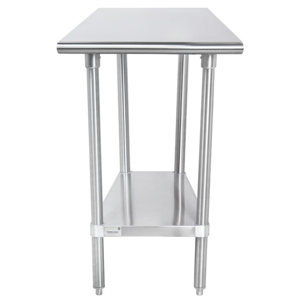 A stainless steel Advance Tabco work table with an undershelf.