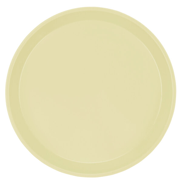 A white round Cambro cafeteria tray with a round rim.