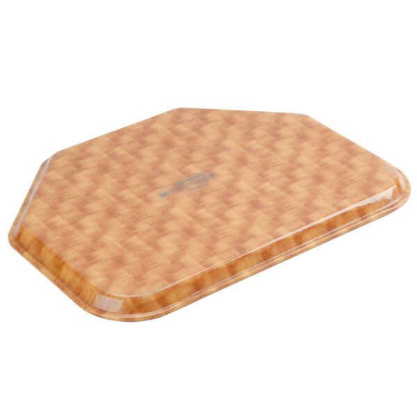 A close-up of a trapezoid shaped light brown fiberglass tray with a basketweave pattern.
