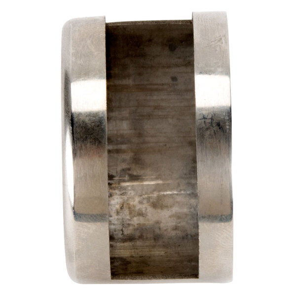 A metal air shutter ring with a metal object in the center.