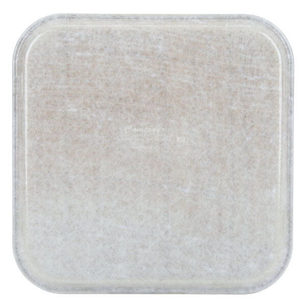 A square white Cambro fiberglass tray with a white surface.