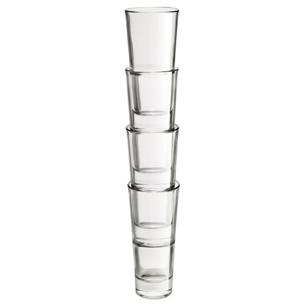 A stack of Libbey highball glasses on a white background.