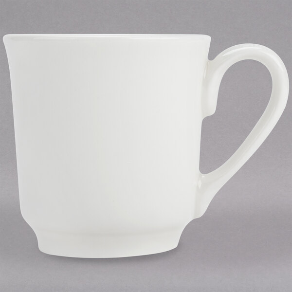 A Homer Laughlin Pristine Ameriwhite white china tea cup with a handle.