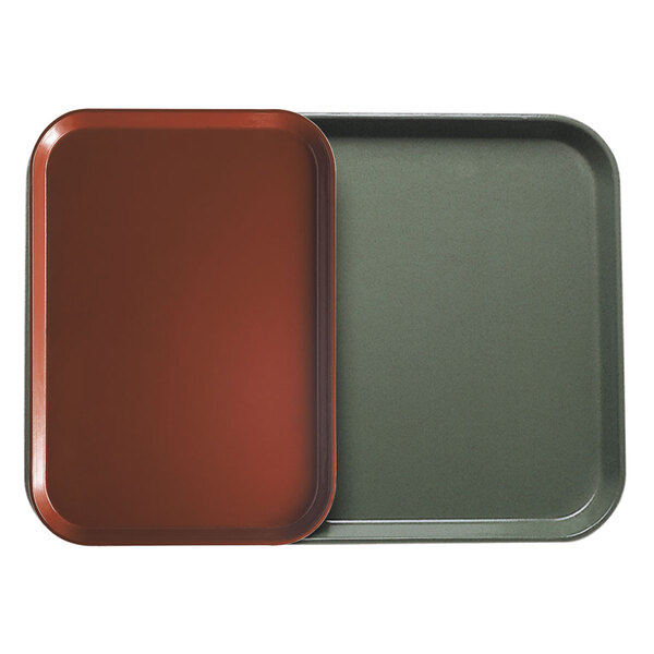 A green rectangular Cambro tray insert.