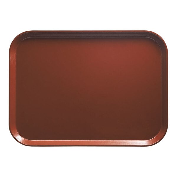 A rectangular red Cambro fiberglass tray with a black border.