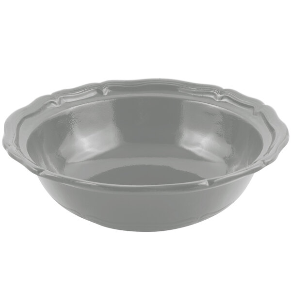 A Bon Chef cast aluminum salad bowl with a scalloped edge in a gray sandstone finish.