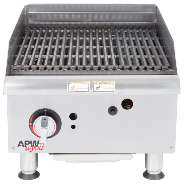 An APW Wyott charbroiler with a metal top and a grill.