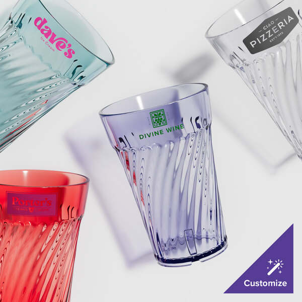 A close-up of a clear GET Tahiti plastic tumbler.