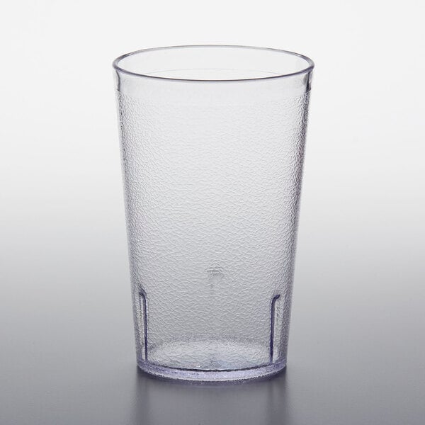 A clear plastic GET tumbler on a white surface.