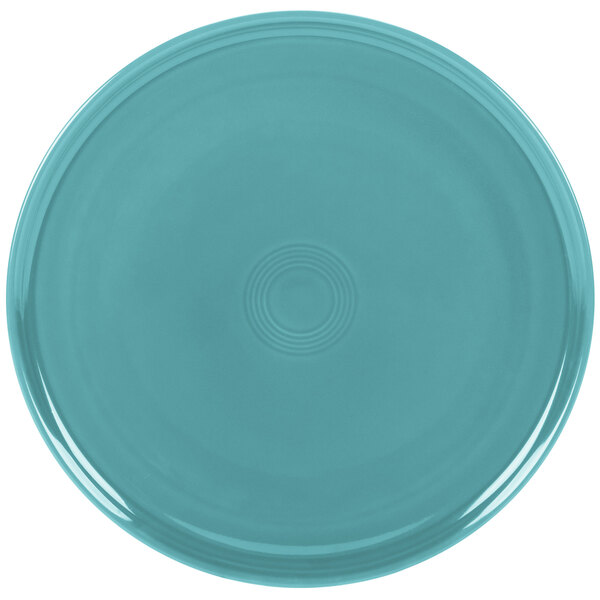 A turquoise Fiesta china baking tray with a circle pattern in the middle.