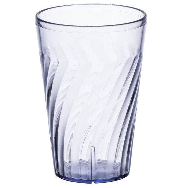 A blue SAN plastic tumbler with a wavy design.