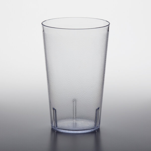 A clear plastic GET tumbler on a white surface.