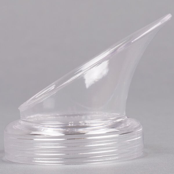 A clear plastic pour lid with a pointed tip for GET SM bottles.