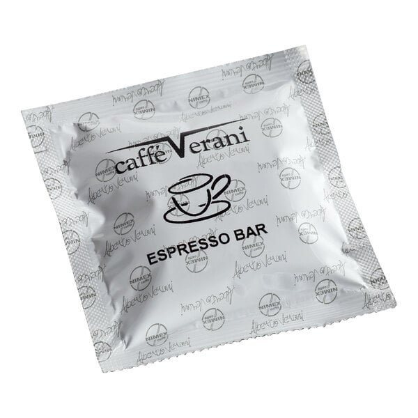A sealed, square silver packet labeled 'caffe Verani ESPRESSO BAR' with a cup illustration and repeated branding on the packaging.