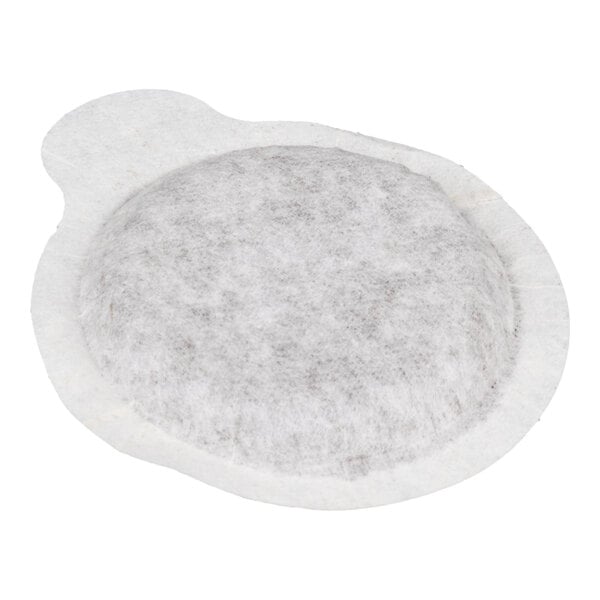 A round, white, single-serve coffee pod with a slightly textured surface and a small tab on one side.