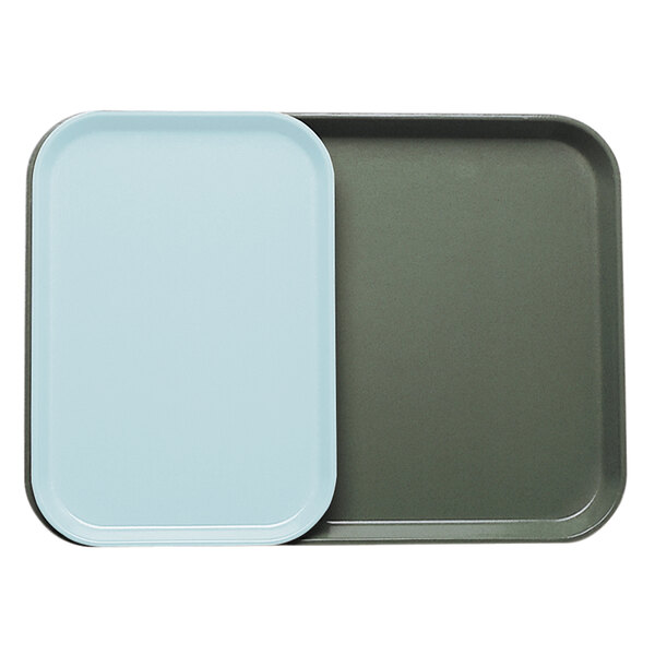 A close-up of a blue rectangular Cambro tray insert.