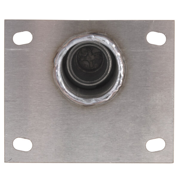 A metal plate with a hole in it.