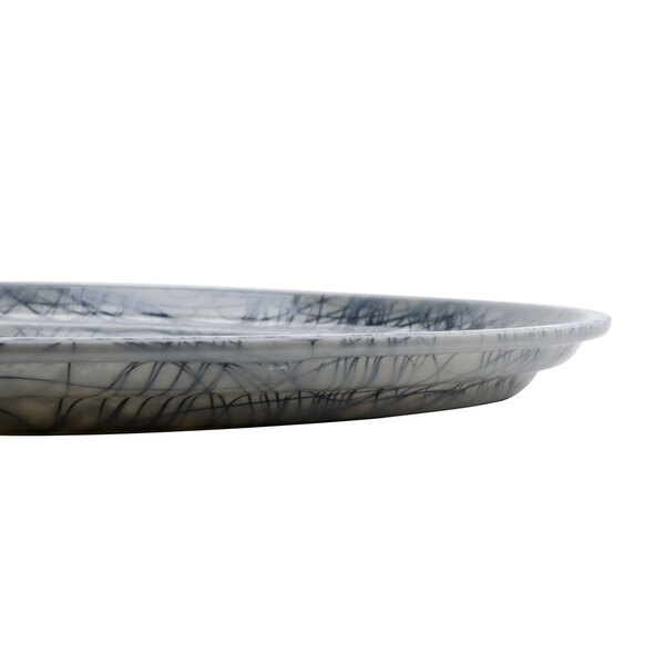 A gray Cambro oval tray with a black swirl design.