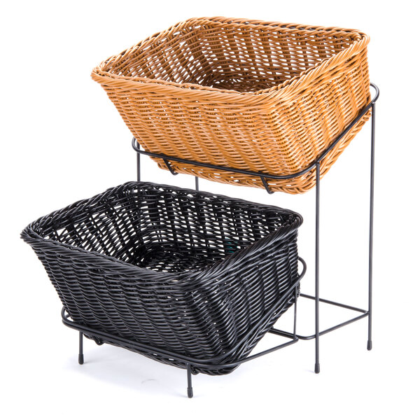 Two rectangular woven baskets, one black and one light brown, are stacked on a black metal stand.