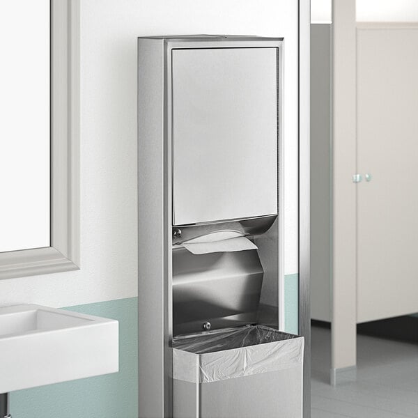 A silver stainless steel rectangular paper towel dispenser and waste receptacle.
