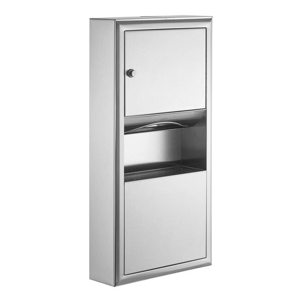 A silver metal Bobrick paper towel dispenser and waste receptacle cabinet with a door.