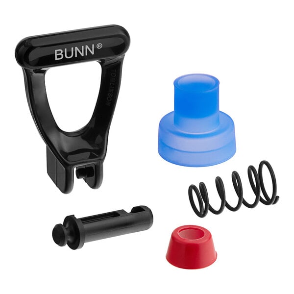 A black and white Bunn faucet repair kit with a spring inside.