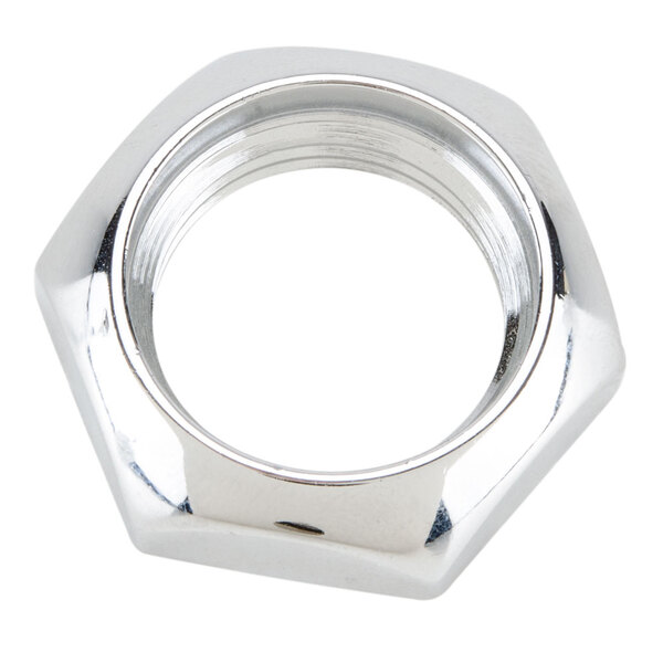 A close up of a silver metal Bunn shank nut with a hole in it.