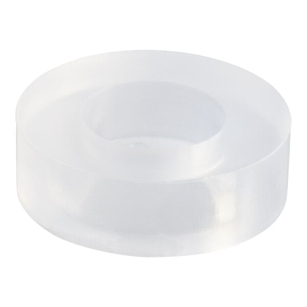 A white plastic round washer with a hole in it.
