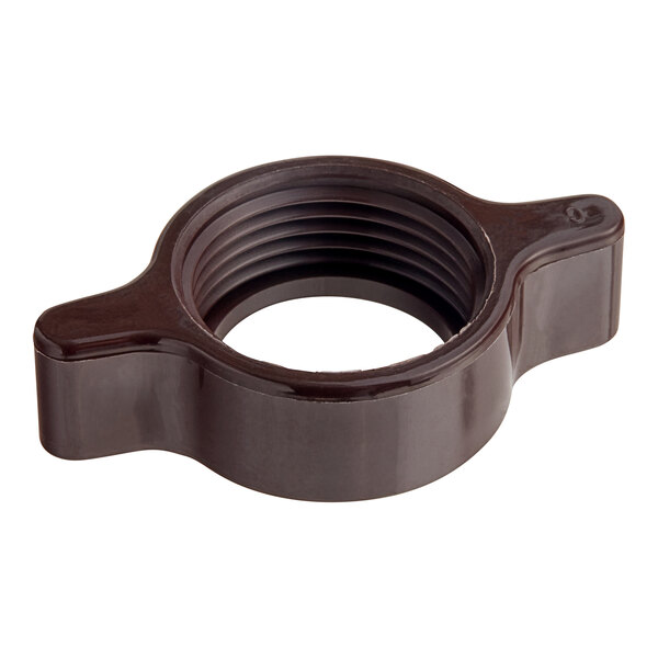 A brown plastic Bunn faucet wing nut with a hole in it.