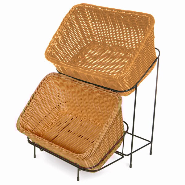 A honey-colored polypropylene basket on a black metal stand.