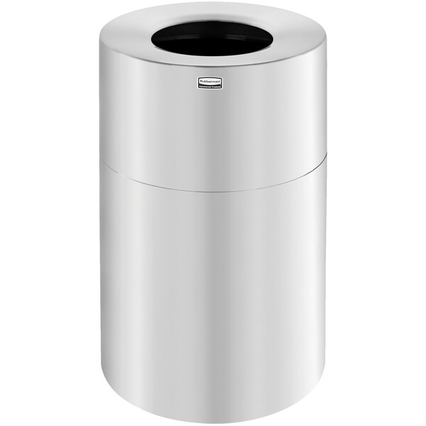 A white cylindrical trash can with a black lid.