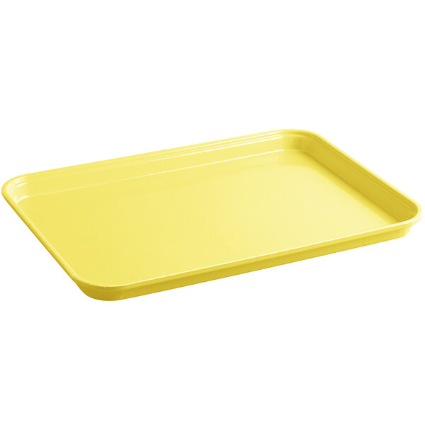 A yellow rectangular Cambro market tray with a handle.