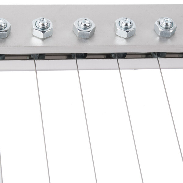 A Martellato cutting arm with nuts and bolts on it.