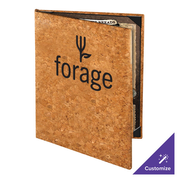 A standing menu cover made of natural cork material with the word 'forage' and a plant-themed logo printed on the front.