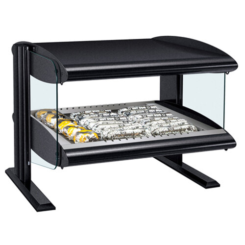 A black food warmer with a glass shelf of food inside.