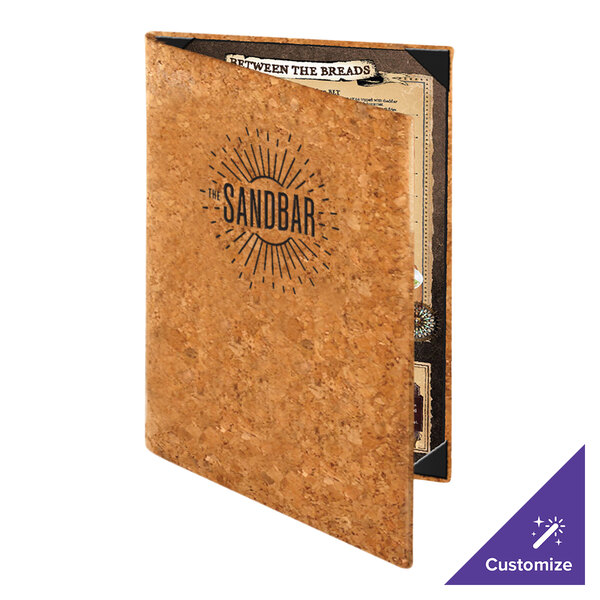A standing menu cover made of cork material with 'The Sandbar' logo on the front and a visible menu page inside.
